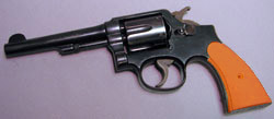 S&W 38 Hand Ejector M&P with orange grips