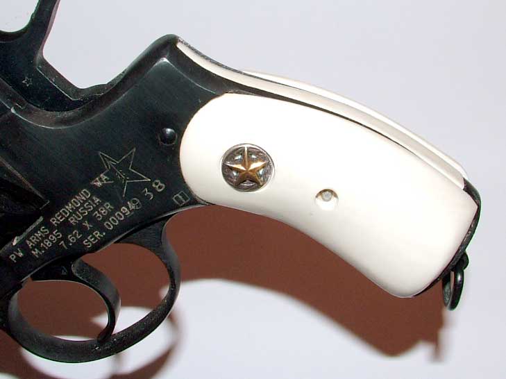 Nagant with oversize grips and small Texas star